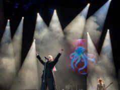 Capa de lixo do present do The Remedy em Londres para o Teenage Most cancers Belief