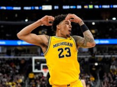 O número 1 de Michigan trava enquanto o inquieto Howard abraça o momento