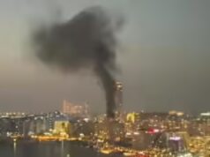 Detritos de interceptação aérea atingem prédio na Marina de Dubai