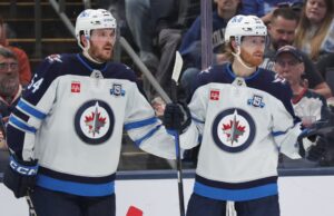 Connor marca duas vezes na vitória dos Jets sobre os Blue Jackets para permanecer na disputa dos playoffs