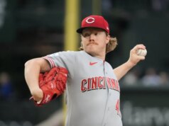 Os Cubs liderados por Michael Busch venceram os Reds em 10º pela sétima vitória consecutiva
