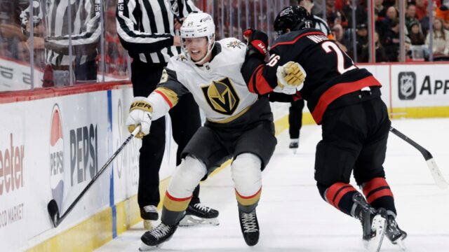 Vegas-Golden-Knights-right-wing-Pavel-Dorofeyev-16-and-Carolina-Hurricanes-defenseman-Sean-Walker-26.jpeg