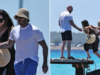 Victoria Beckham evita habilmente escorregões perigosos escalando rochas de Ibiza de salto alto