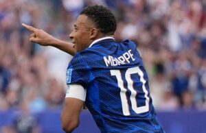 A dobradinha de Mbappé coloca a França nas oitavas de last após vitória sobre o Iraque atingida pelo clima